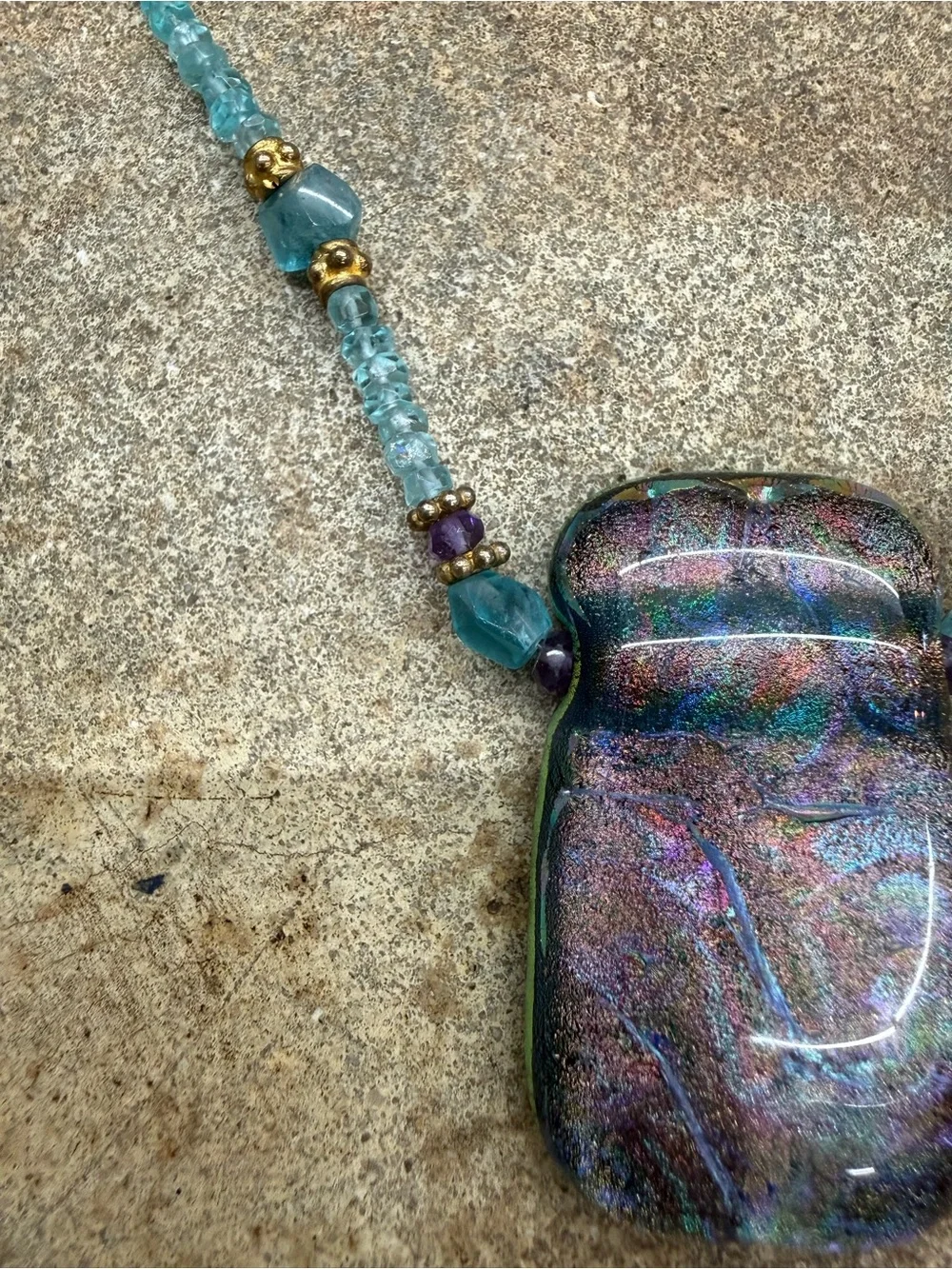 Handcrafted Teal Beaded Necklace with Iridescent Purple Pendant